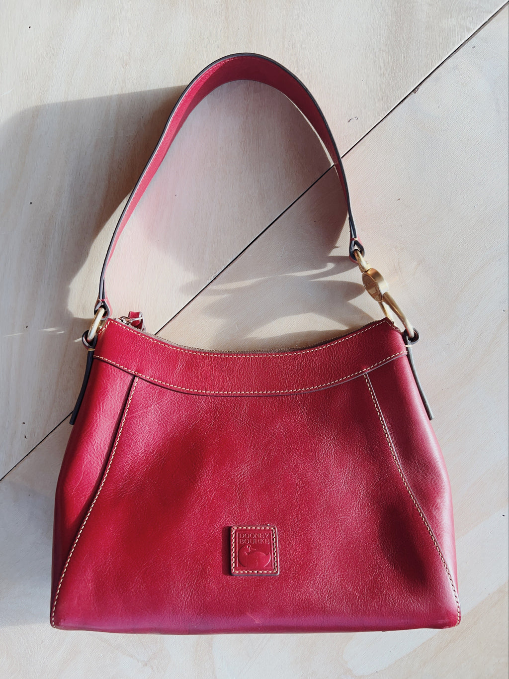 Dooney & Bourke cherry vachetta leather shoulder bag
